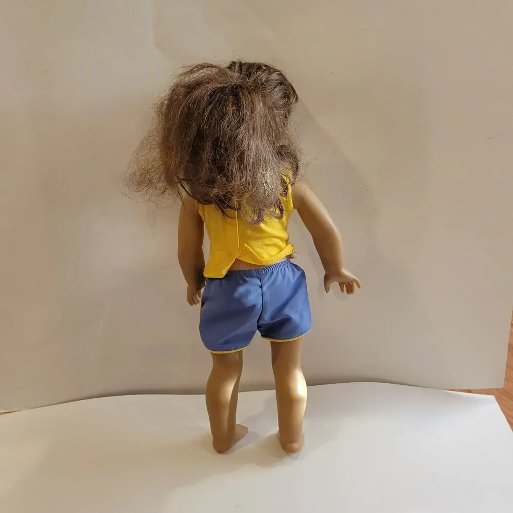 American Girl Doll Grey eyes light brown  hair.